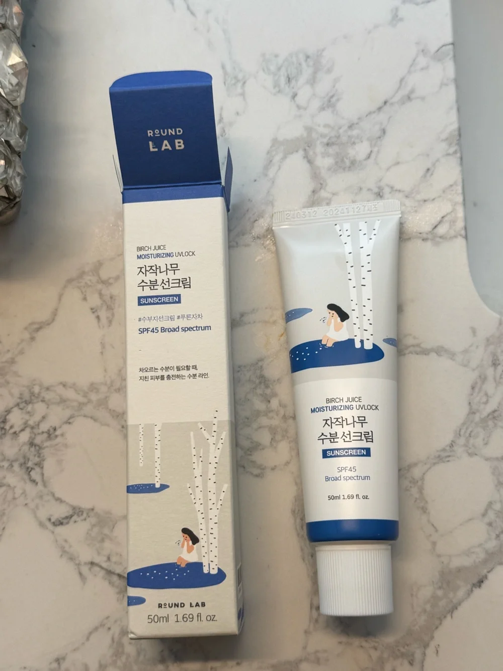 Round Lab Birch Juice Moisturizing UV Lock Sunscreen - White & Blue